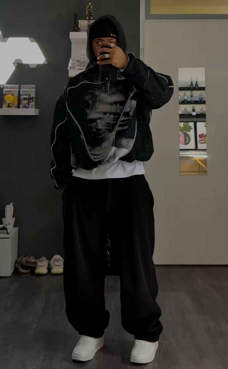 Black hoodie and baggy pants streetwear outfit